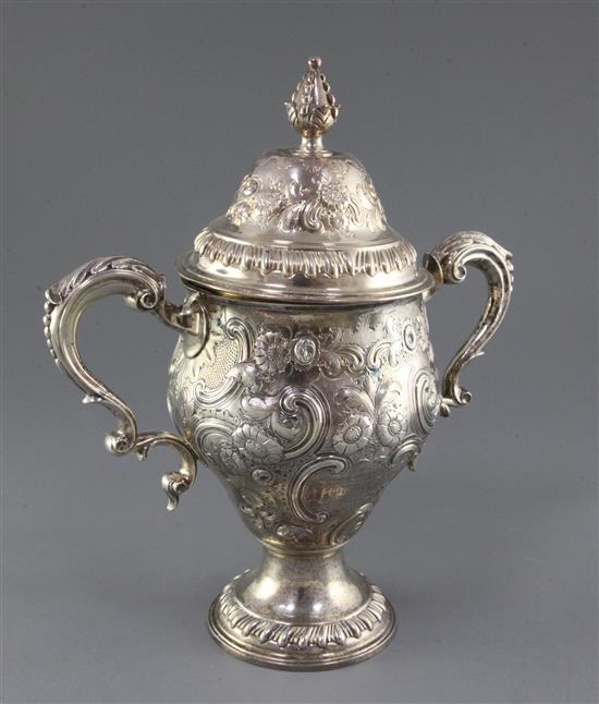 A George III silver two handled pedestal cup and cover by Edward Aldridge I, 34 oz.